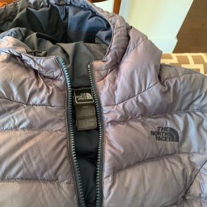 Women’s north face down jacket.